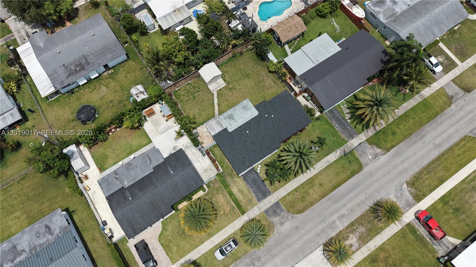 731 Northwest 17th Street Homestead, FL 33030 - Photo 27 of 29 an aerial view of residential houses with outdoor space