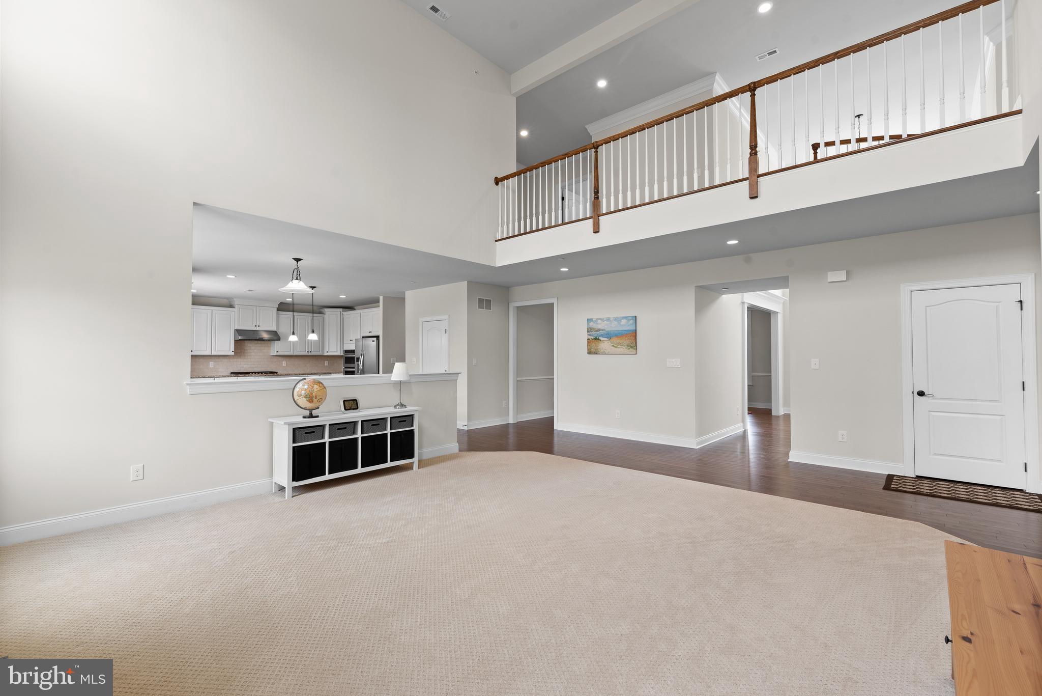 3905 Lewis Run Road Newtown Square, PA 19073 - Photo 12 of 34 Family room with view of Kitchen and upstairs hall