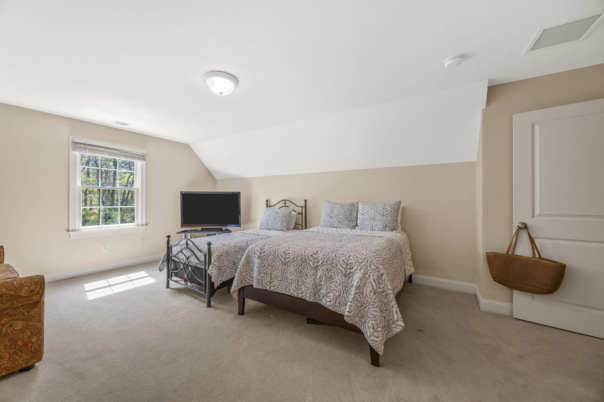 17 Payamps Road Mashpee, MA 02649 - Photo 55 of 72 a bedroom with a bed and a couch