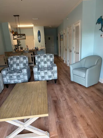 a living room with couches and a coffee table