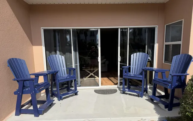 a view of living room with furniture and a window