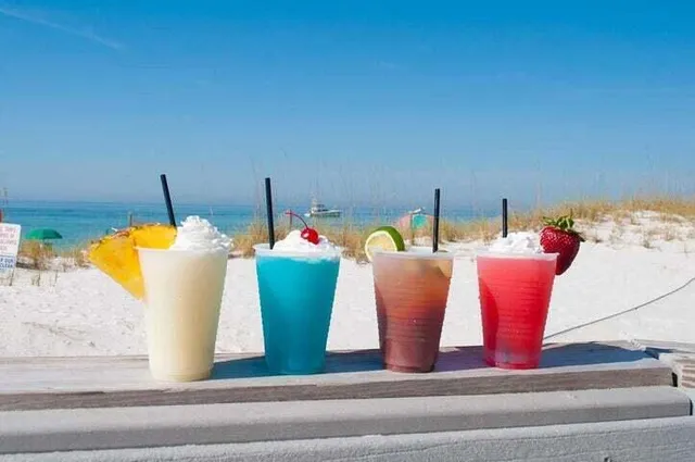 a view of a room with an empty space and wooden floor