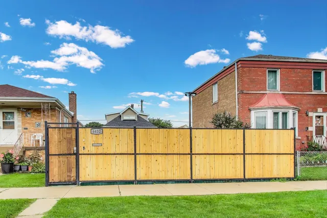 a view of house with yard