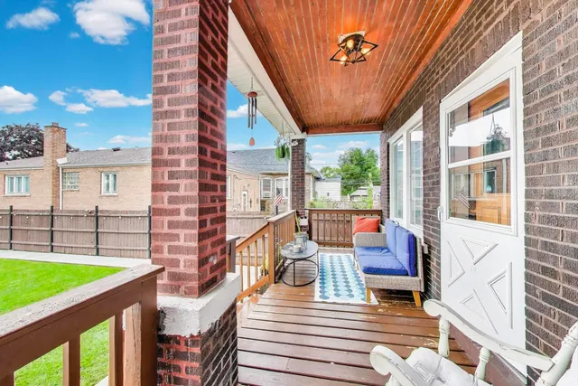 a view of a white building with front door