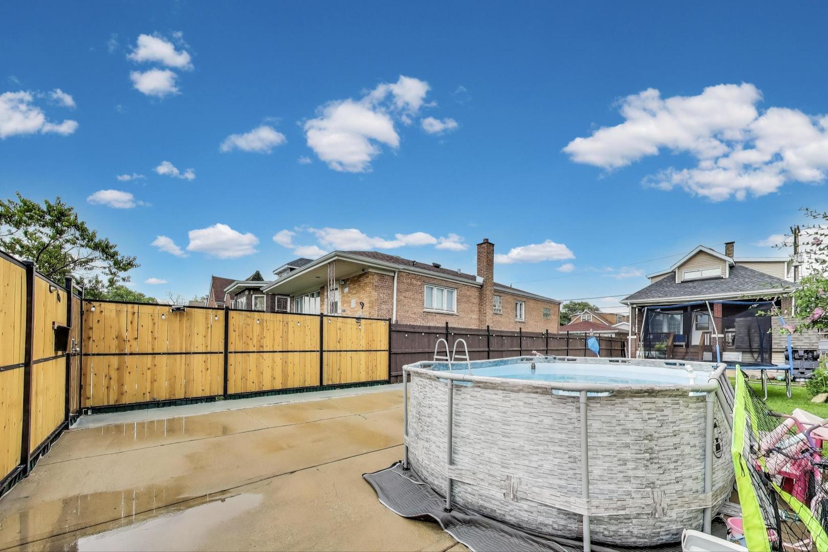 6432 South Kilpatrick Avenue Chicago, IL 60629 - Photo 36 of 36 a view of a white building with front door