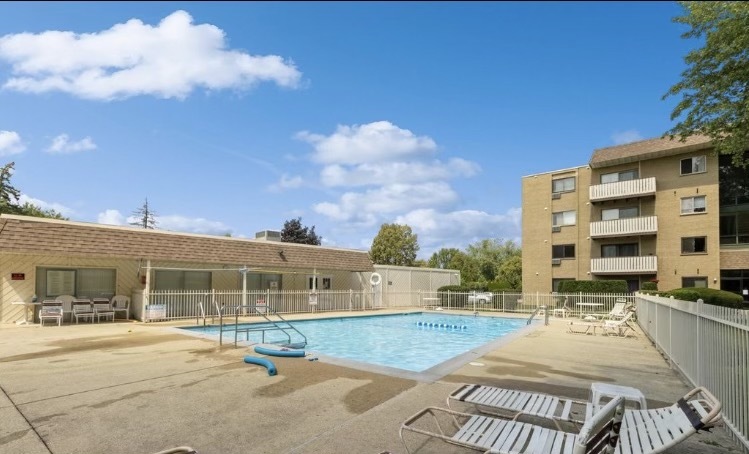 280 North Westgate Road, Unit 331 Mount Prospect, IL 60056 - Photo 2 of 28 a front view of a building with a yard