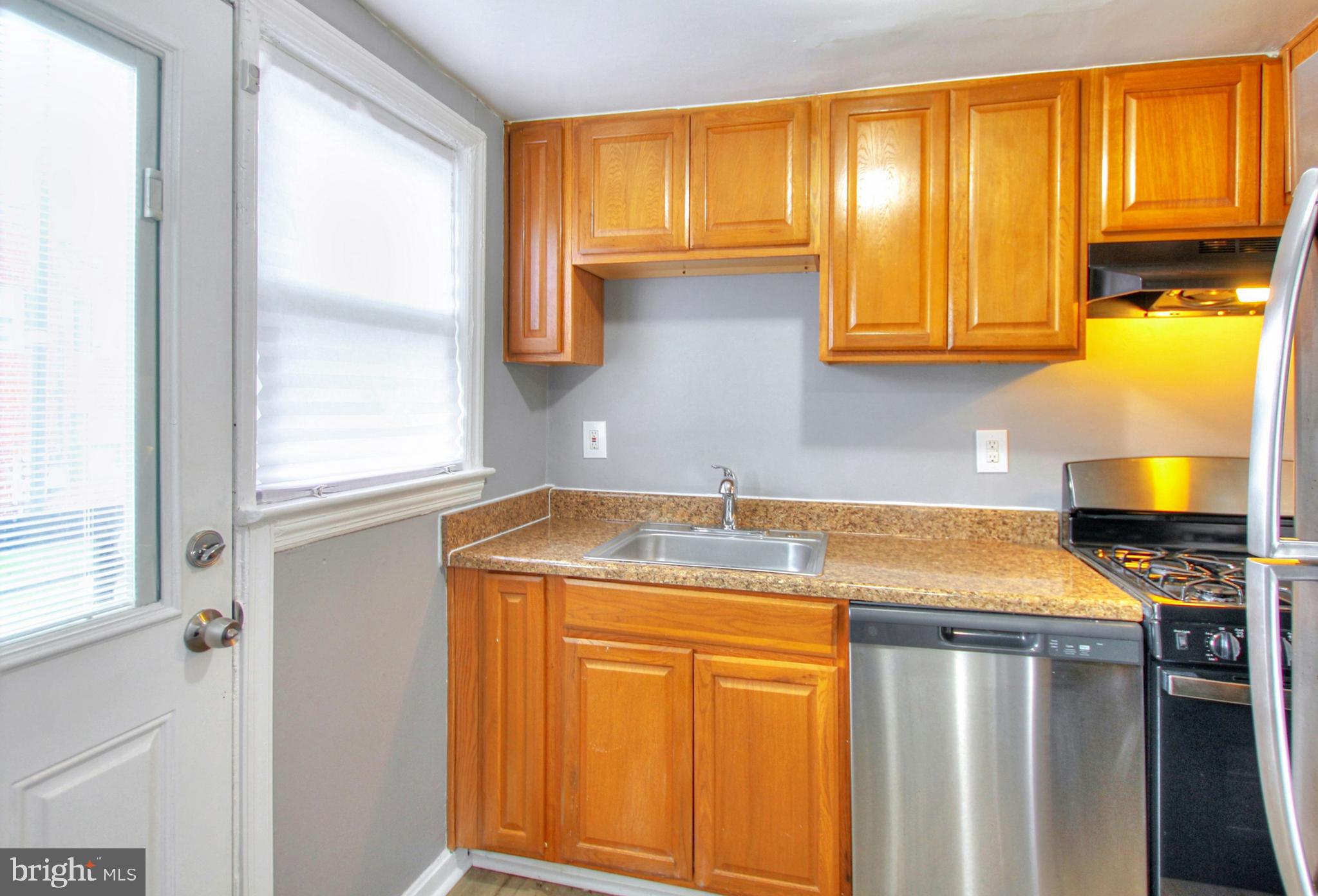 2580 Iverson Street Temple Hills, MD 20748 - Photo 12 of 19 a utility room with a sink and a window