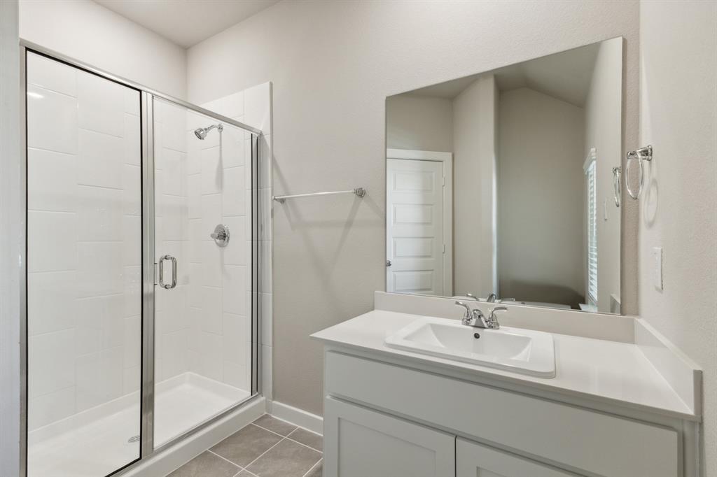 676 Poppy Lane Lavon, TX 75166 - Photo 32 of 35 Bathroom in the Masters home plan by Trophy Signature Homes – REPRESENTATIVE PHOTO
