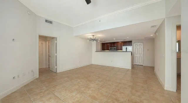 a view of a swimming pool with outdoor seating