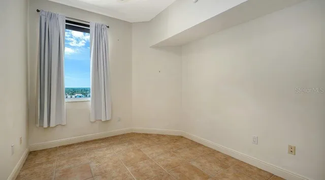 a view of buildings with a big yard