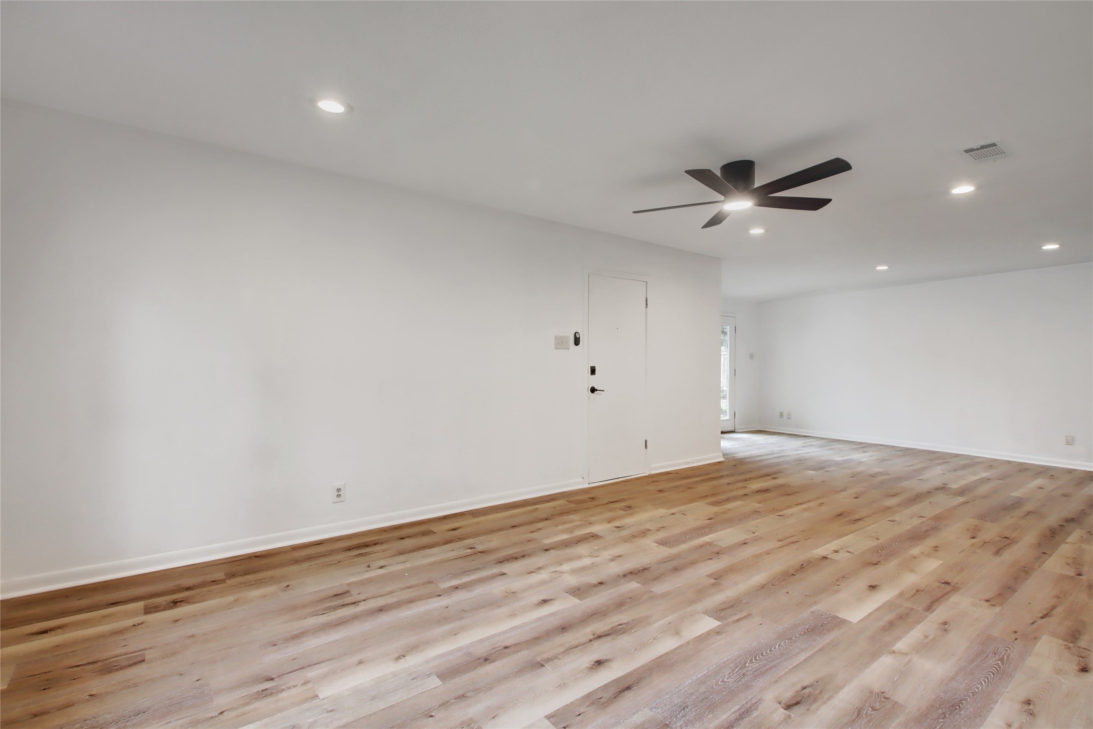 1906 Morrow Street Austin, TX 78757 - Photo 18 of 36 wooden floor in an empty room