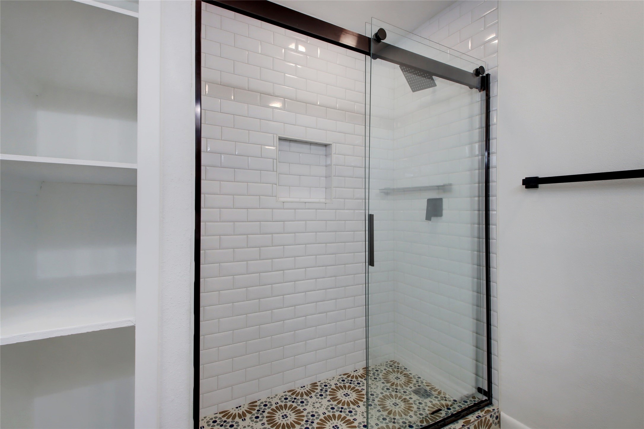 1906 Morrow Street Austin, TX 78757 - Photo 22 of 36 a bathroom with a glass door shower