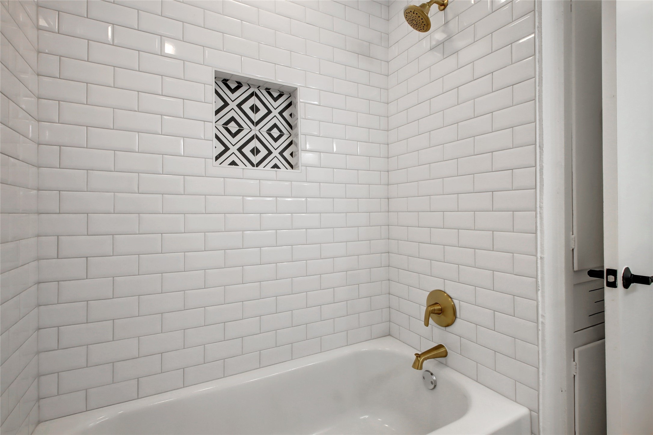 1906 Morrow Street Austin, TX 78757 - Photo 27 of 36 a bathroom with a bathtub