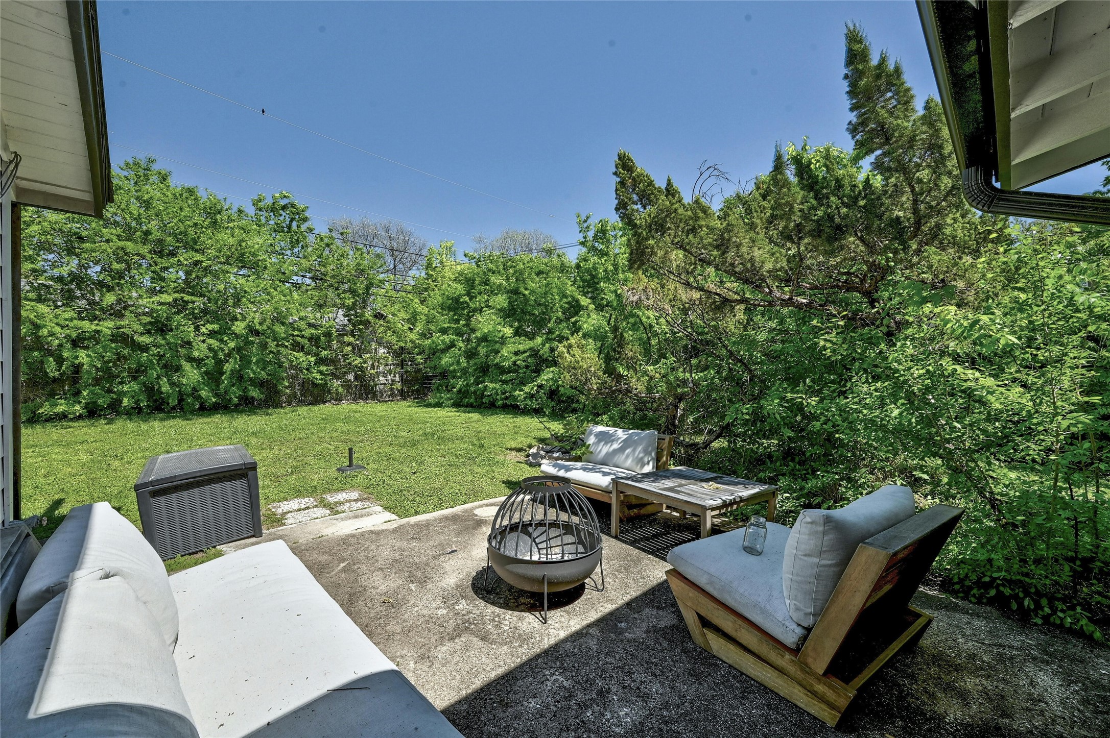 1906 Morrow Street Austin, TX 78757 - Photo 29 of 36 a view of a backyard with sitting area furniture and garden