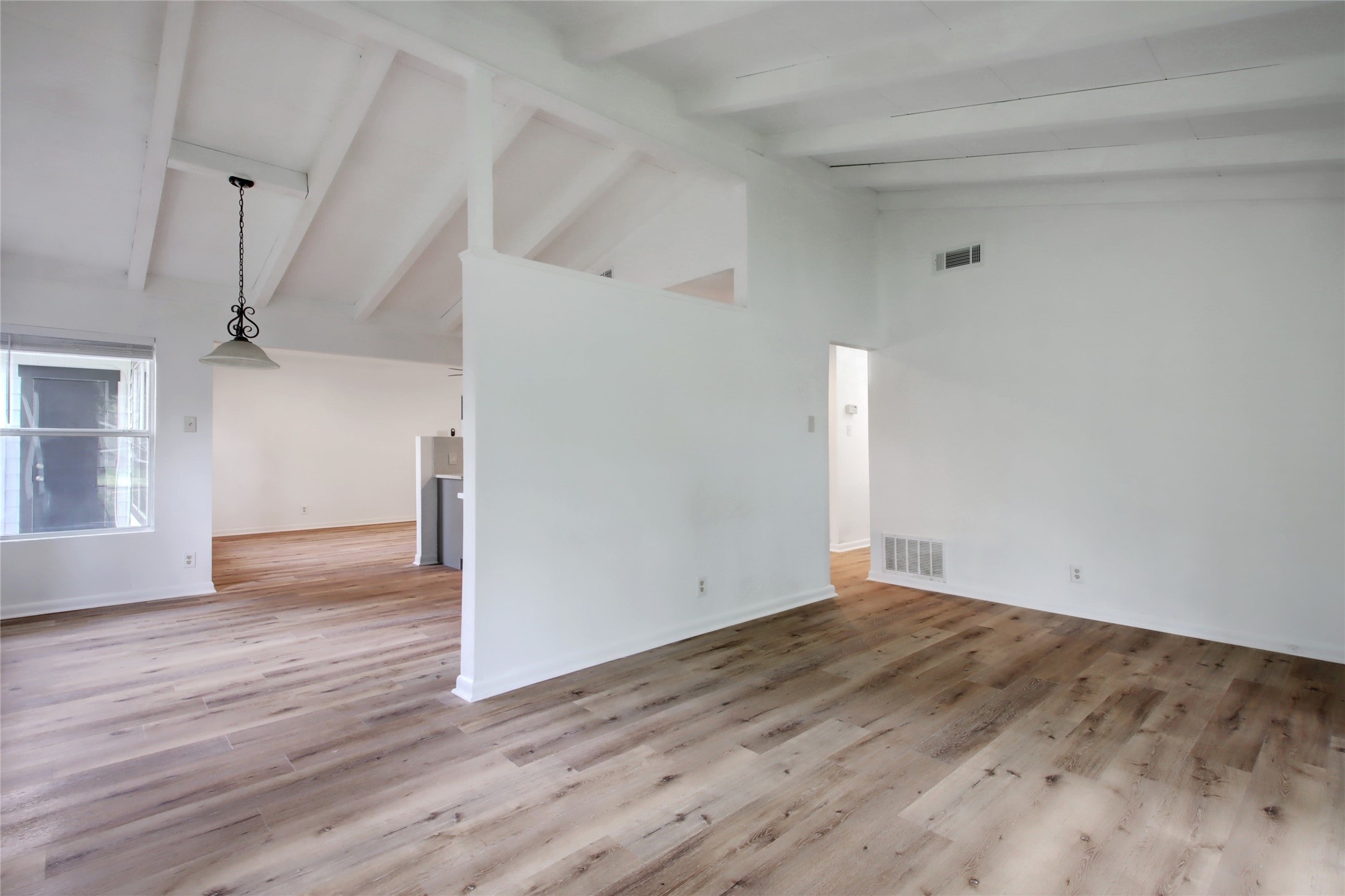 1906 Morrow Street Austin, TX 78757 - Photo 8 of 36 a view of empty room with wooden floor