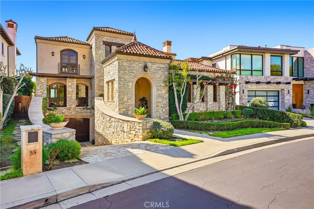 a front view of a house with yard