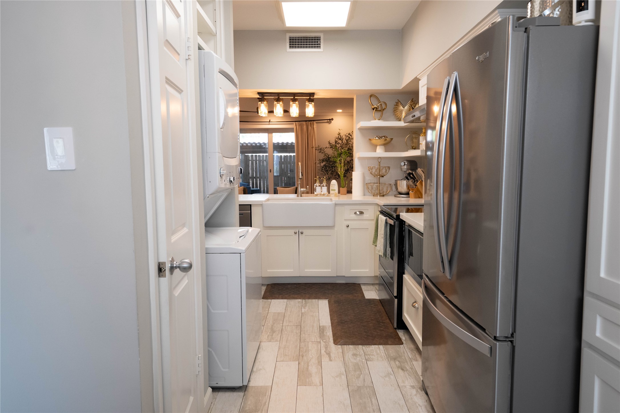 7447 Brompton Street, Unit 7447 Houston, TX 77025 - Photo 14 of 27 Double door steel and steel refrigerator comes with the home!