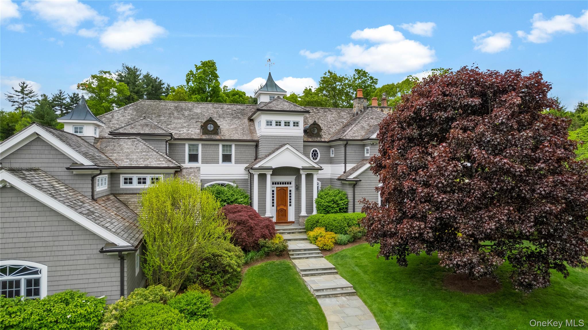63 Old Mill River Road Pound Ridge, NY 10576 - Photo 2 of 47 a aerial view of a house