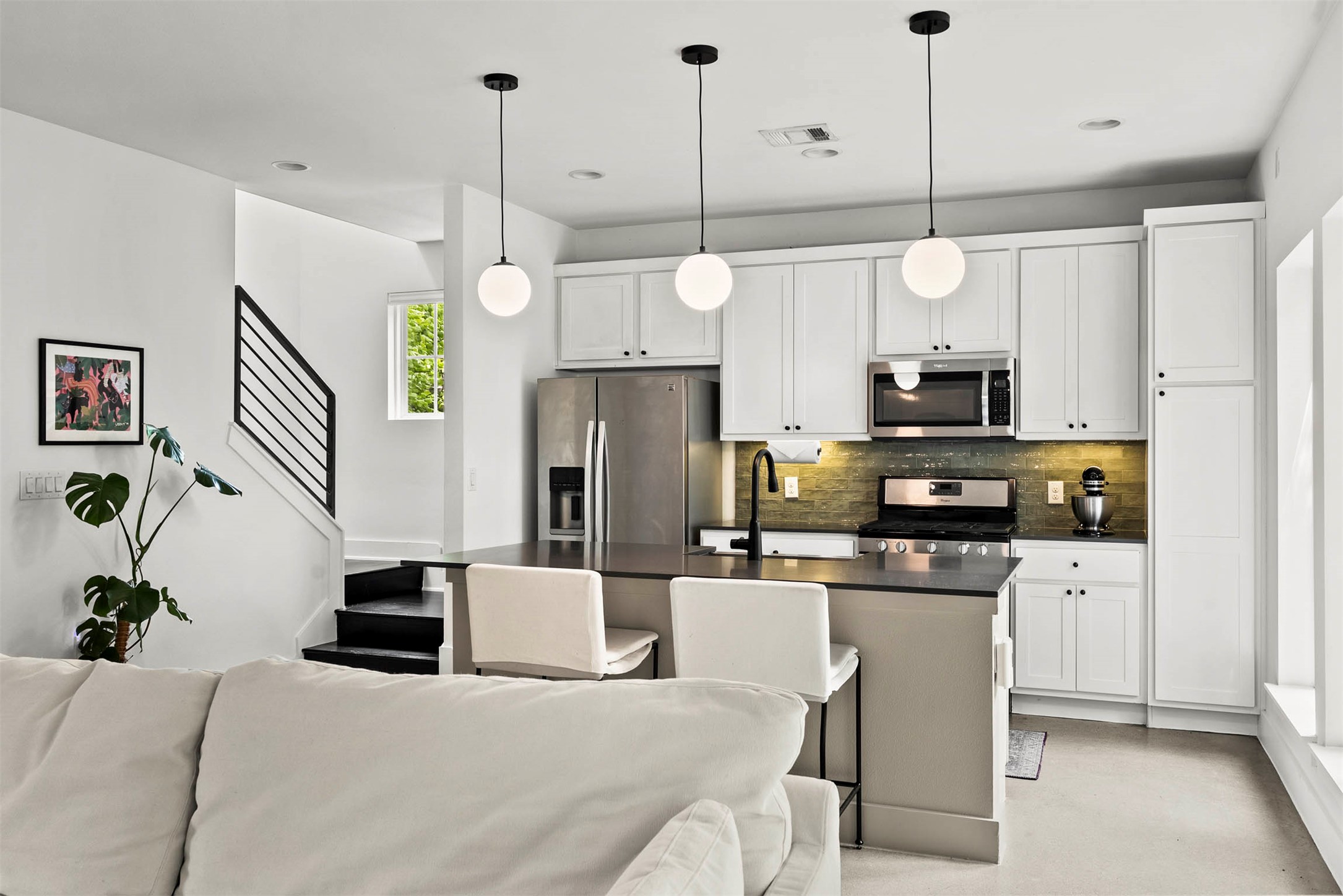 1213 Eleanor Street, Unit B Austin, TX 78721 - Photo 11 of 35 High ceilings continue through the kitchen, adding to the airy and open feel of the entire main floor
