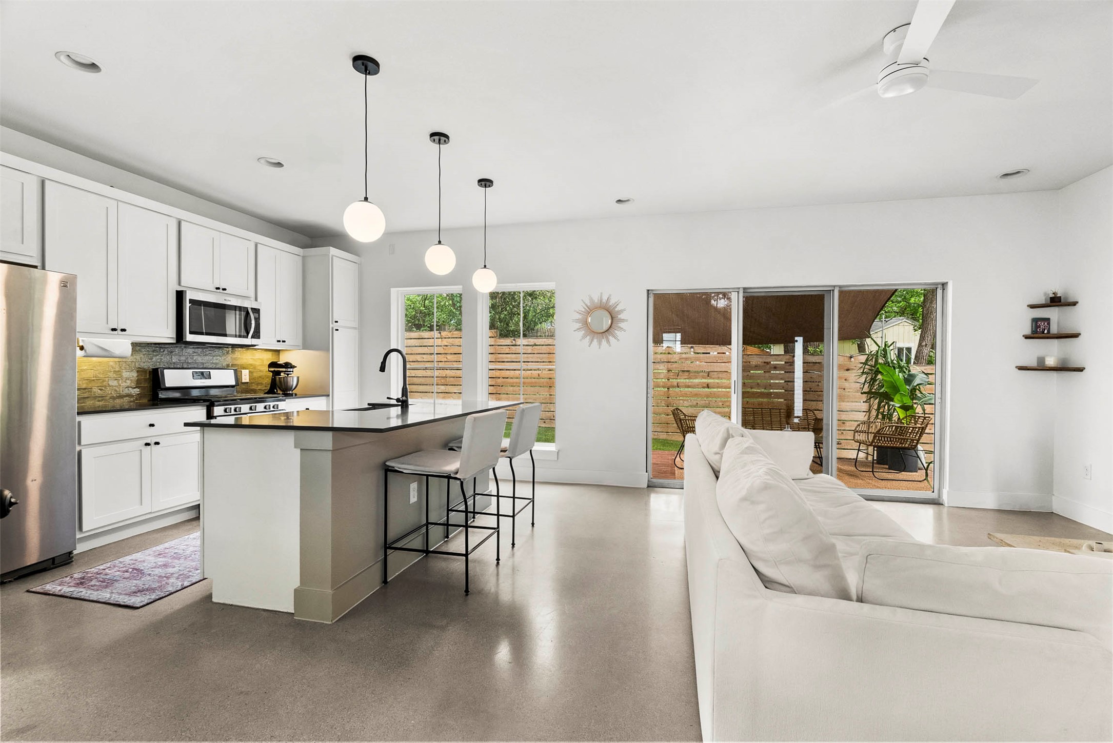 1213 Eleanor Street, Unit B Austin, TX 78721 - Photo 12 of 35 Pull up a couple of stools to the center island breakfast counter for a quick meal or a casual workspace