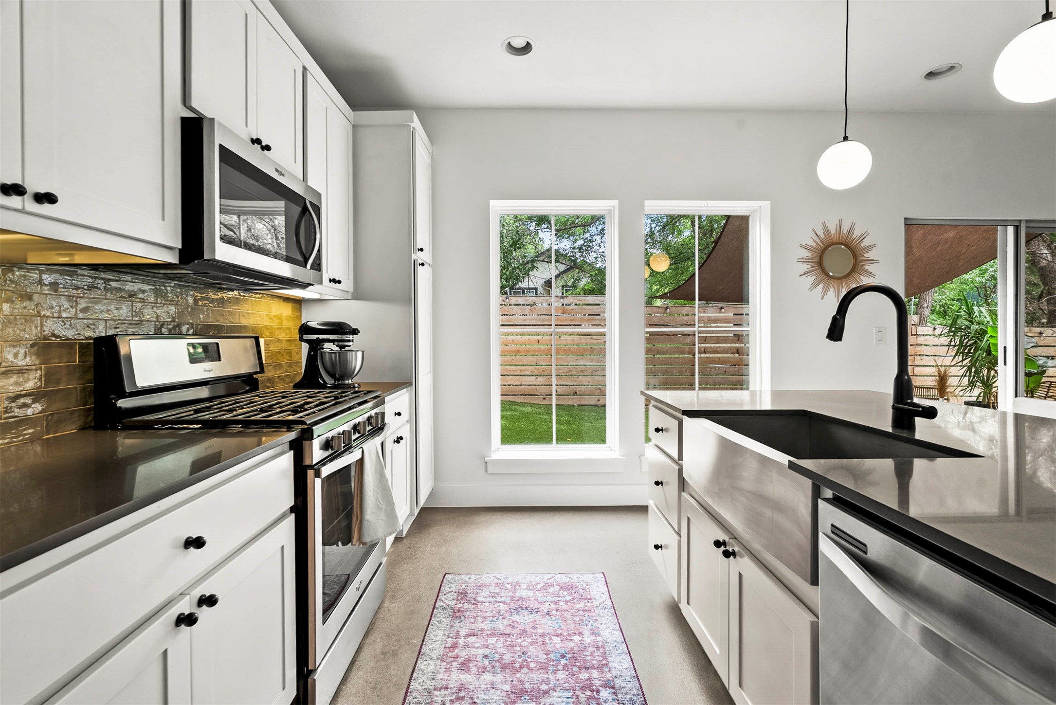 1213 Eleanor Street, Unit B Austin, TX 78721 - Photo 16 of 35 The layout is designed to keep everything within reach, making it easy to move between the stove and the island