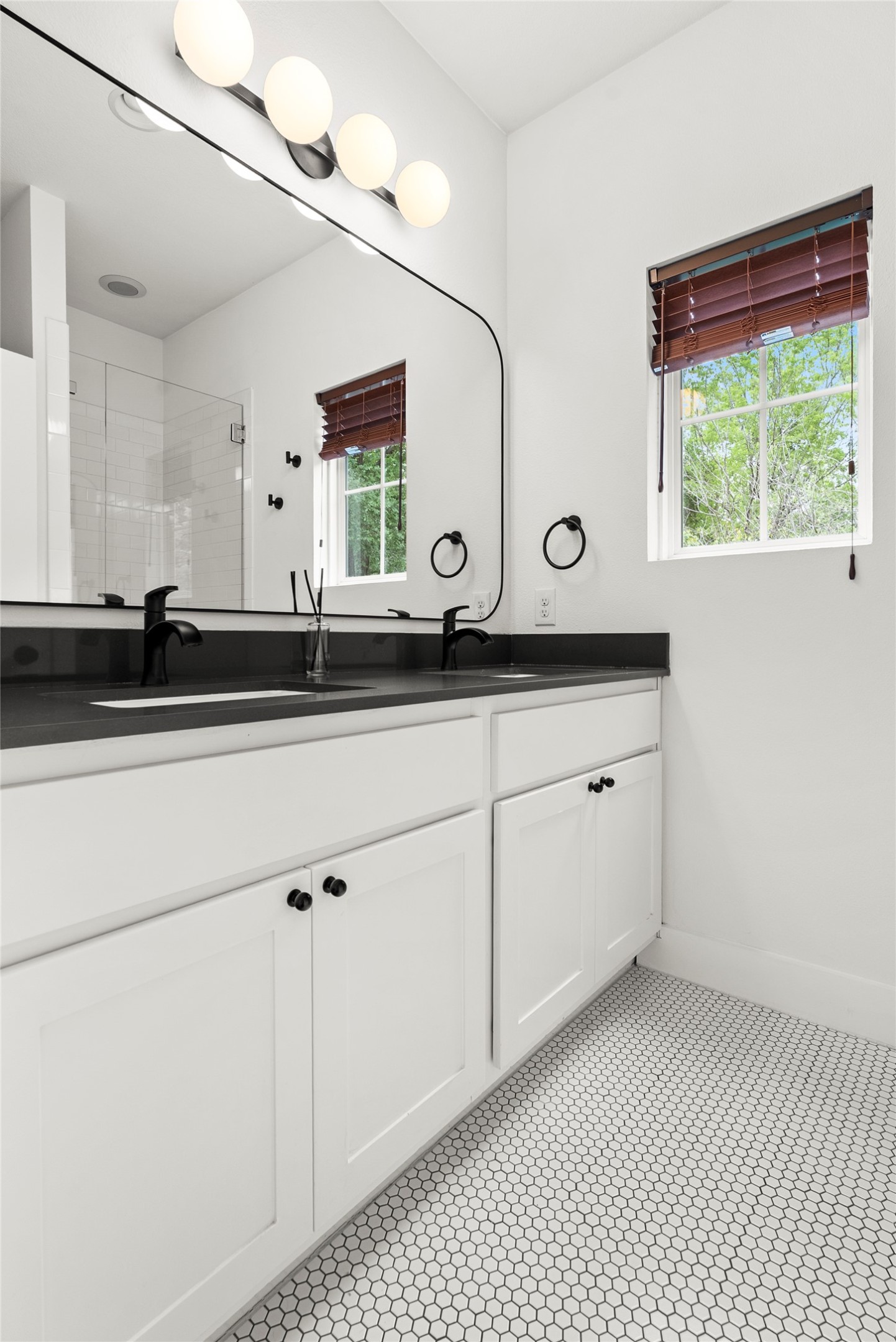 1213 Eleanor Street, Unit B Austin, TX 78721 - Photo 22 of 35 Having a private bath attached directly to the bedroom adds a level of convenience and privacy that is hard to beat