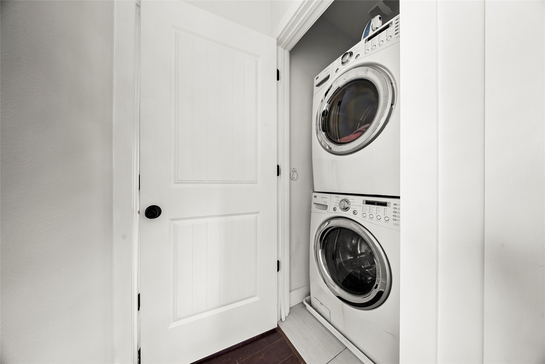 1213 Eleanor Street, Unit B Austin, TX 78721 - Photo 27 of 35 The upstairs laundry closet is perfectly placed near the bedrooms and features convenient stackable connections