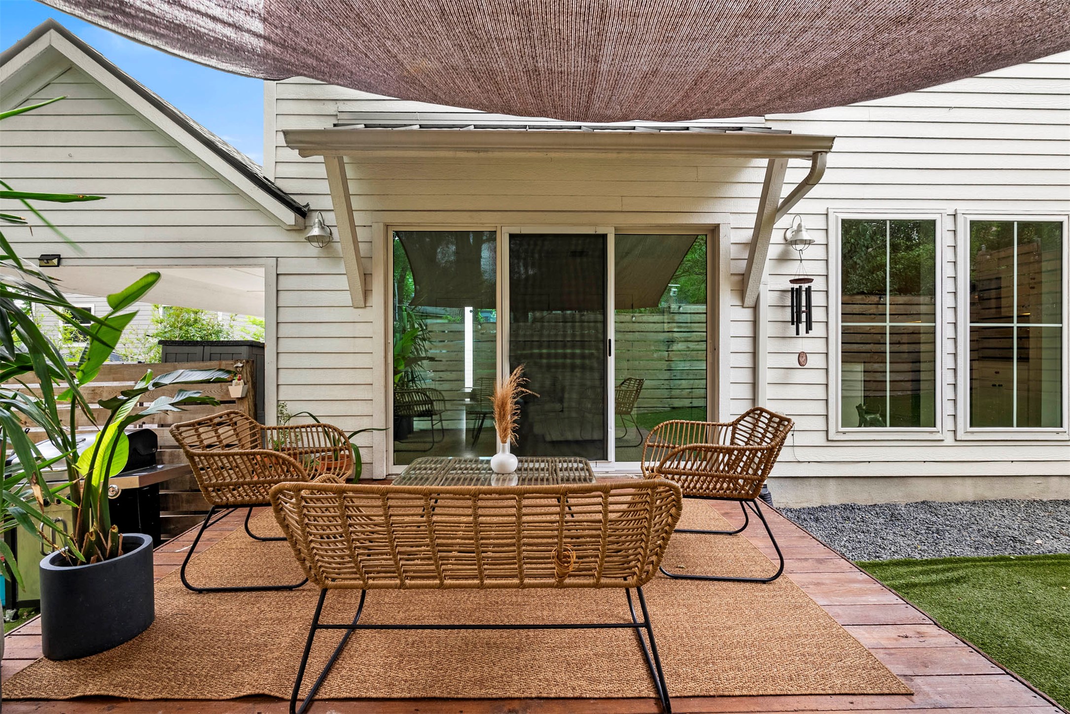 1213 Eleanor Street, Unit B Austin, TX 78721 - Photo 29 of 35 The transition from the stackable doors to the deck makes this the most popular spot in the house for entertaining
