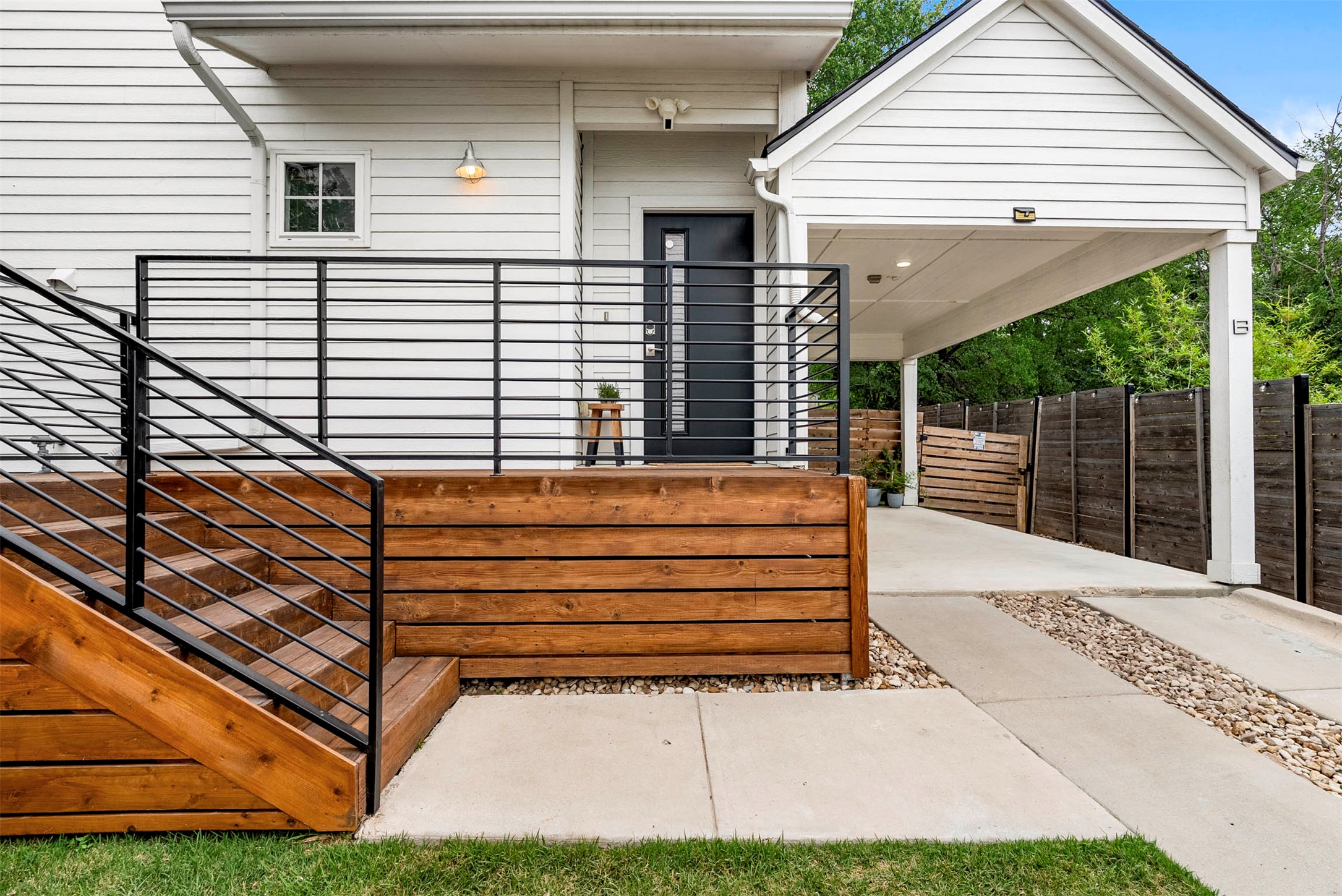 1213 Eleanor Street, Unit B Austin, TX 78721 - Photo 3 of 35 A wide front porch offers a great spot to catch the neighborhood vibe before heading inside this Eleanor Condominiums retreat