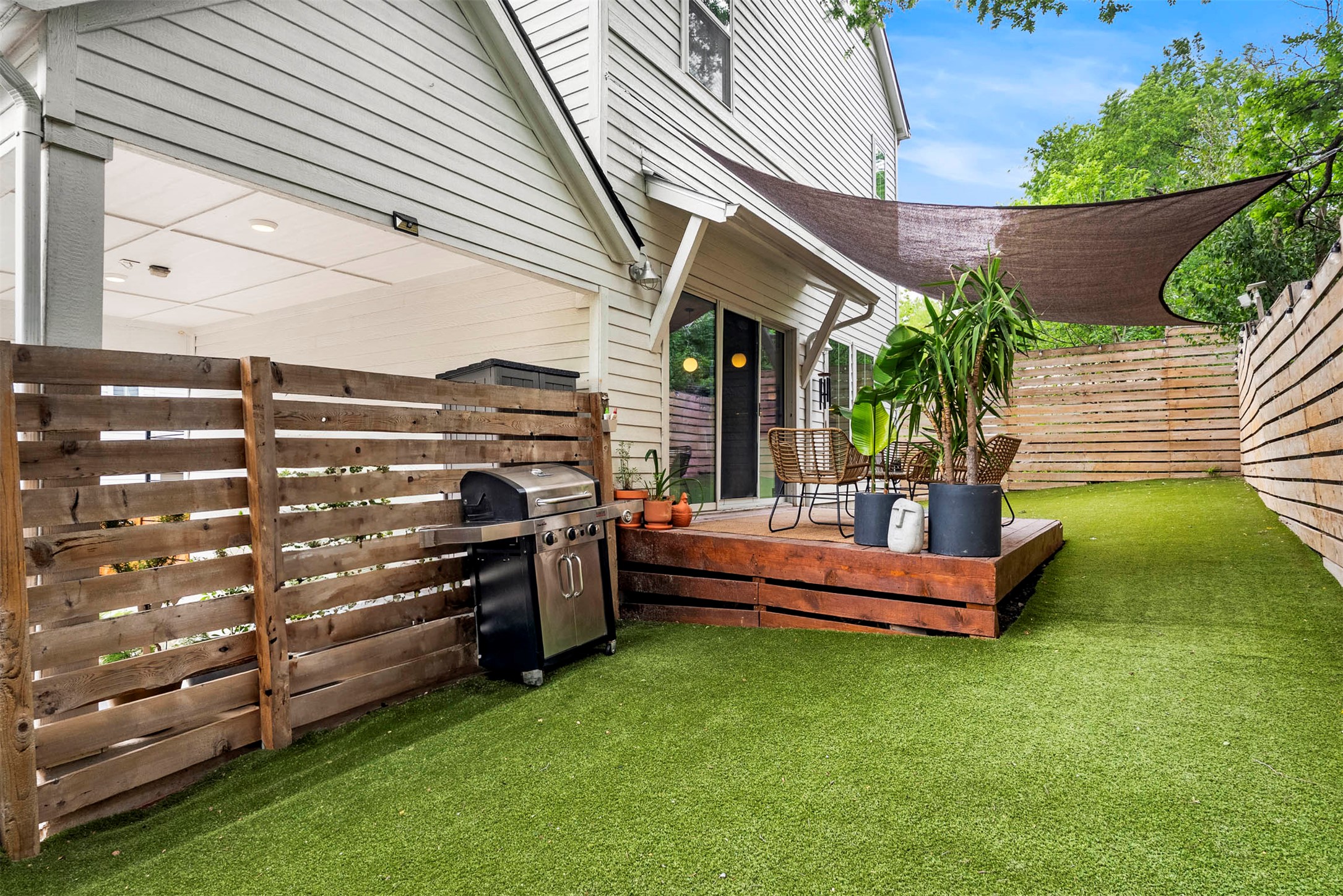 1213 Eleanor Street, Unit B Austin, TX 78721 - Photo 32 of 35 A wood privacy fence encloses the entire yard, giving you a secure space for pets to play or for hosting a BBQ