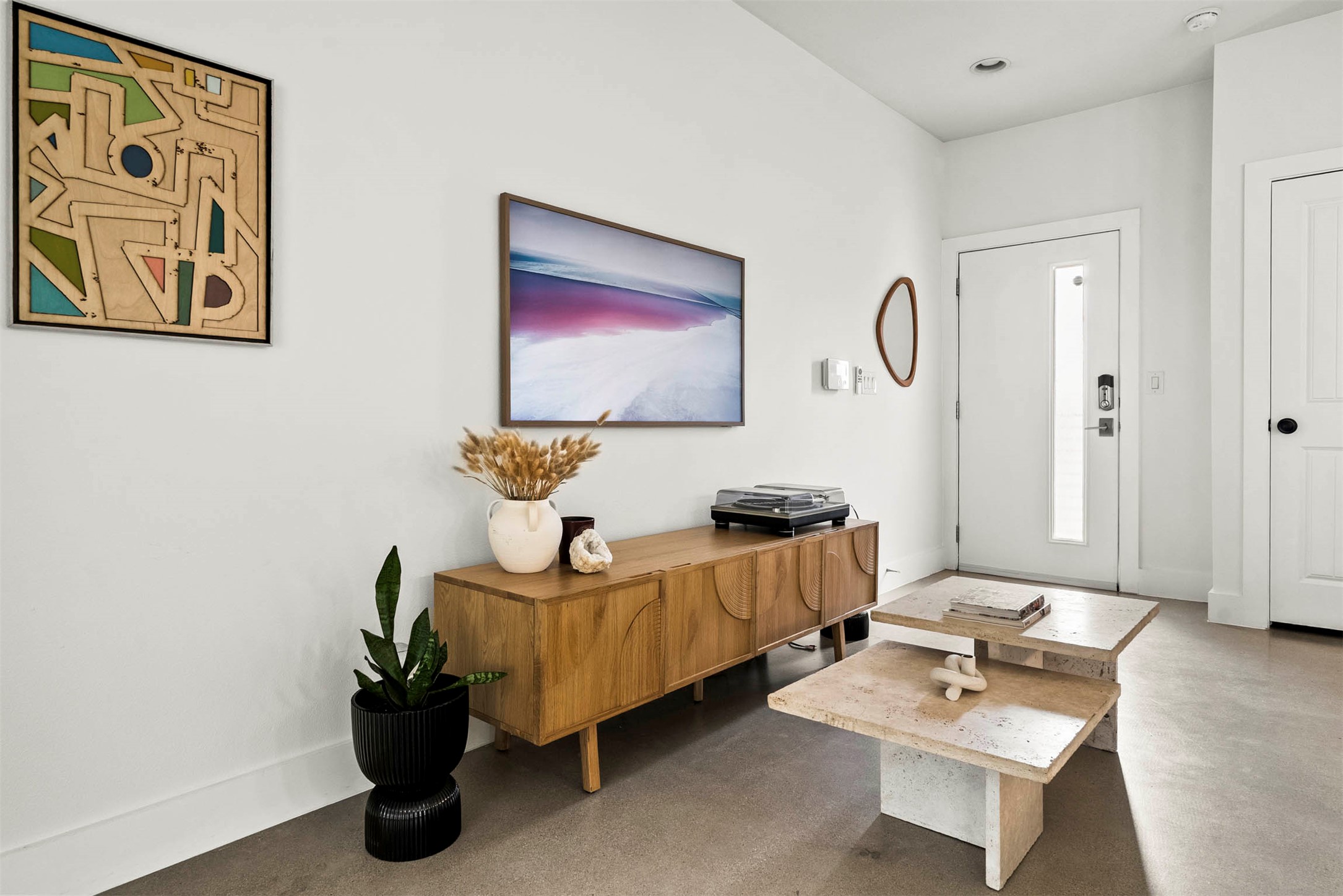 1213 Eleanor Street, Unit B Austin, TX 78721 - Photo 4 of 35 As you walk in, the high ceilings and open layout immediately make the home feel large and full of light