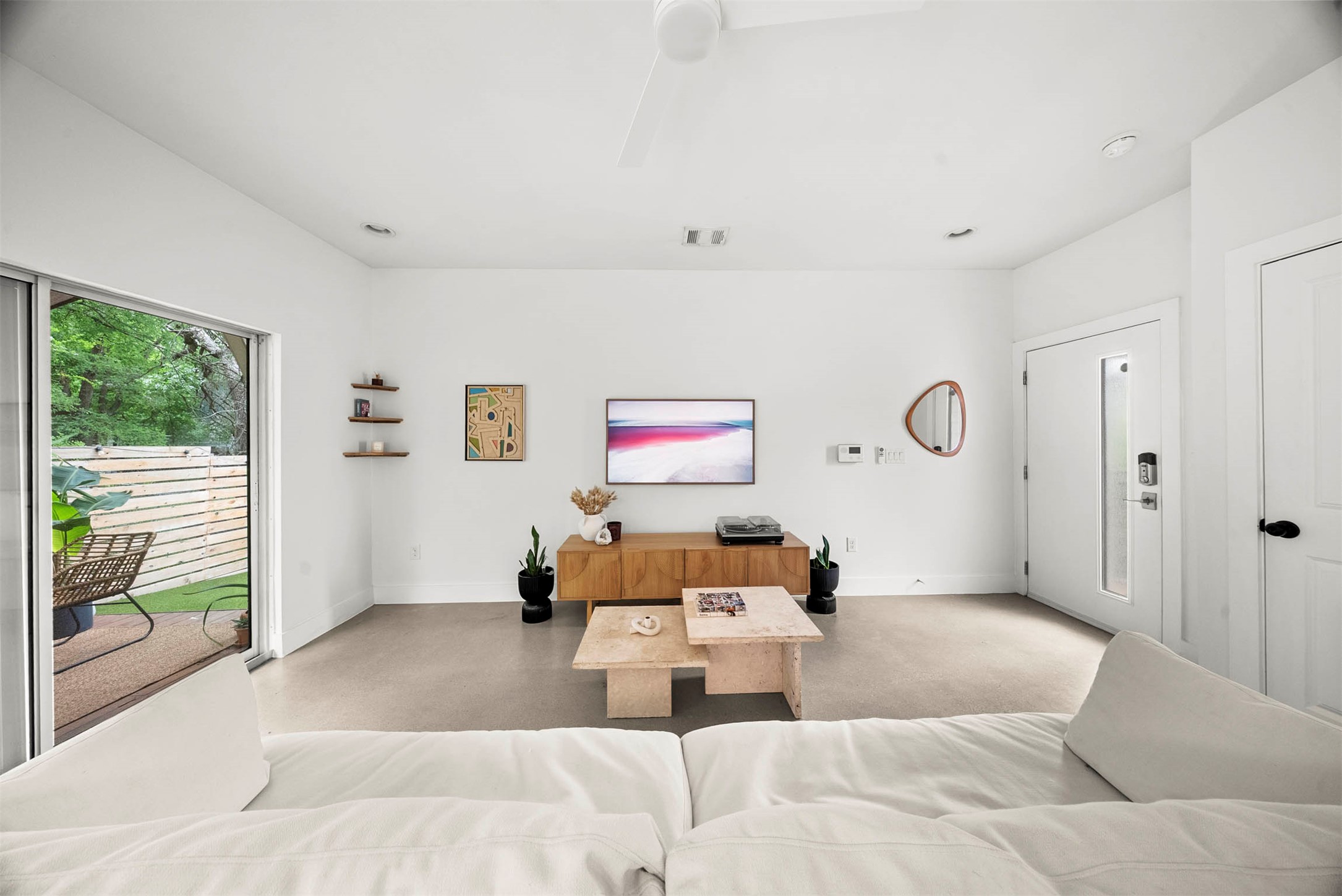 1213 Eleanor Street, Unit B Austin, TX 78721 - Photo 6 of 35 High ceilings and neutral-toned walls create a calm backdrop for your favorite furniture and art pieces