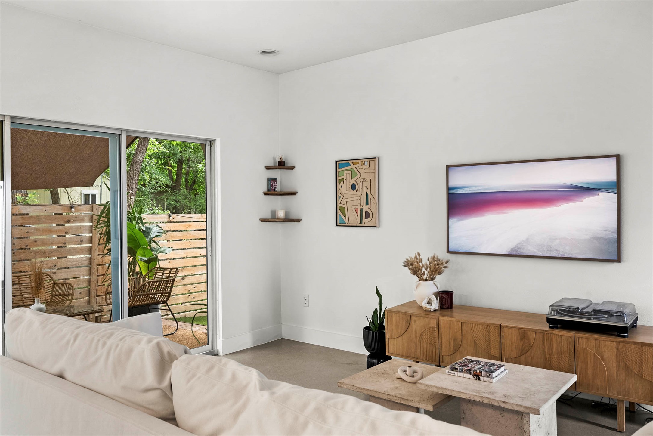 1213 Eleanor Street, Unit B Austin, TX 78721 - Photo 8 of 35 Natural light pours into the living space, making it a bright and inviting spot to spend your afternoons