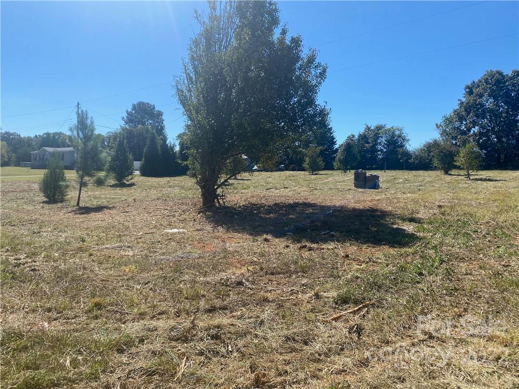3363 Humphries Road Shelby, NC 28150 - Photo 6 of 8 a view of a yard with trees