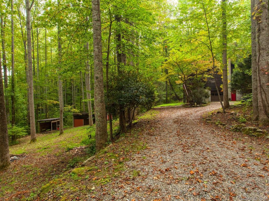 99 Apgar Road Candler, NC 28715 - Photo 16 of 20 a view of outdoor space with deck and backyard