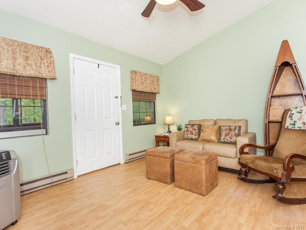 99 Apgar Road Candler, NC 28715 - Photo 4 of 20 a living room with furniture