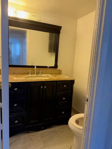 a bathroom with a sink and a toilet