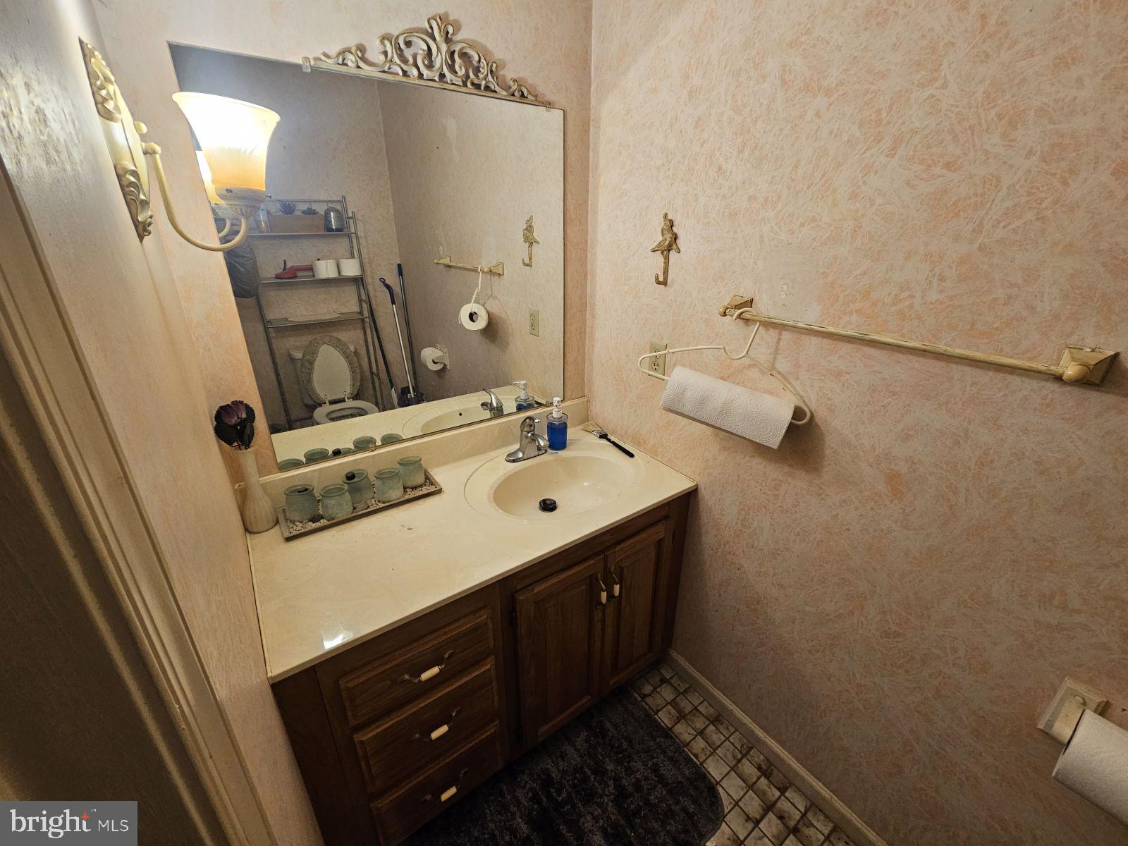 6520 Old Carlisle Road Dover, PA 17315 - Photo 18 of 24 a bathroom with a sink vanity and mirror