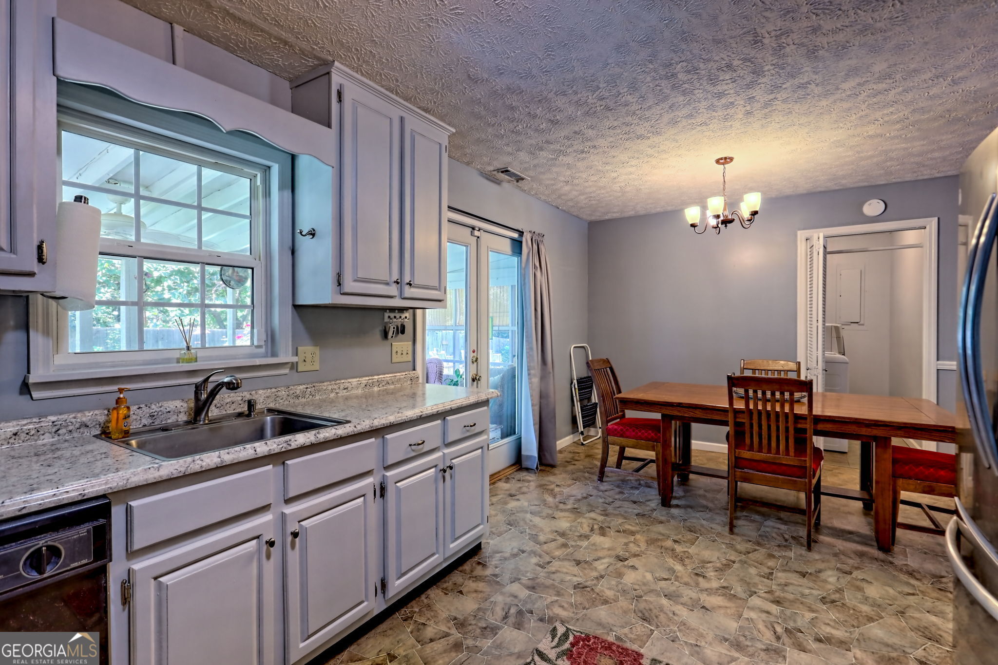 101 Long Street Demorest, GA 30535 - Photo 13 of 61 a kitchen that has a sink and a chair in it
