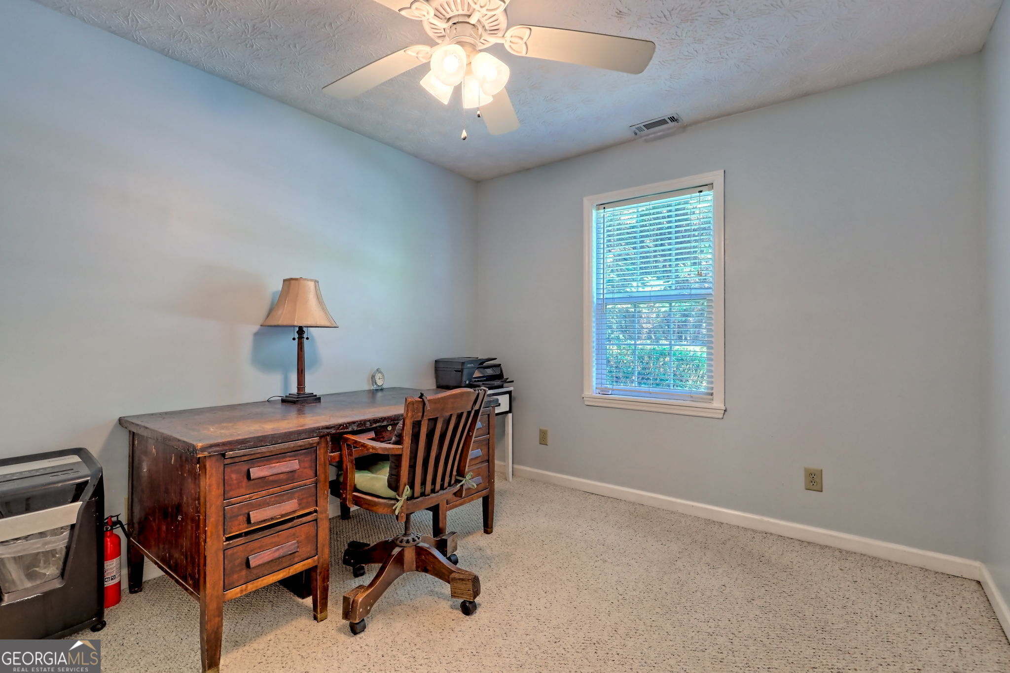 101 Long Street Demorest, GA 30535 - Photo 24 of 61 a view of a workspace with furniture and a window