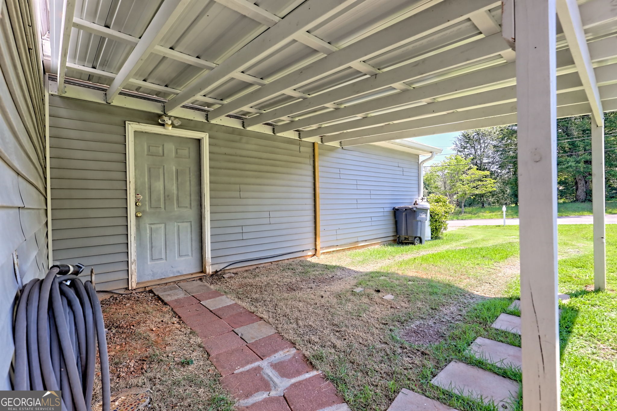 101 Long Street Demorest, GA 30535 - Photo 36 of 61 a view of backyard with large trees and wooden fence
