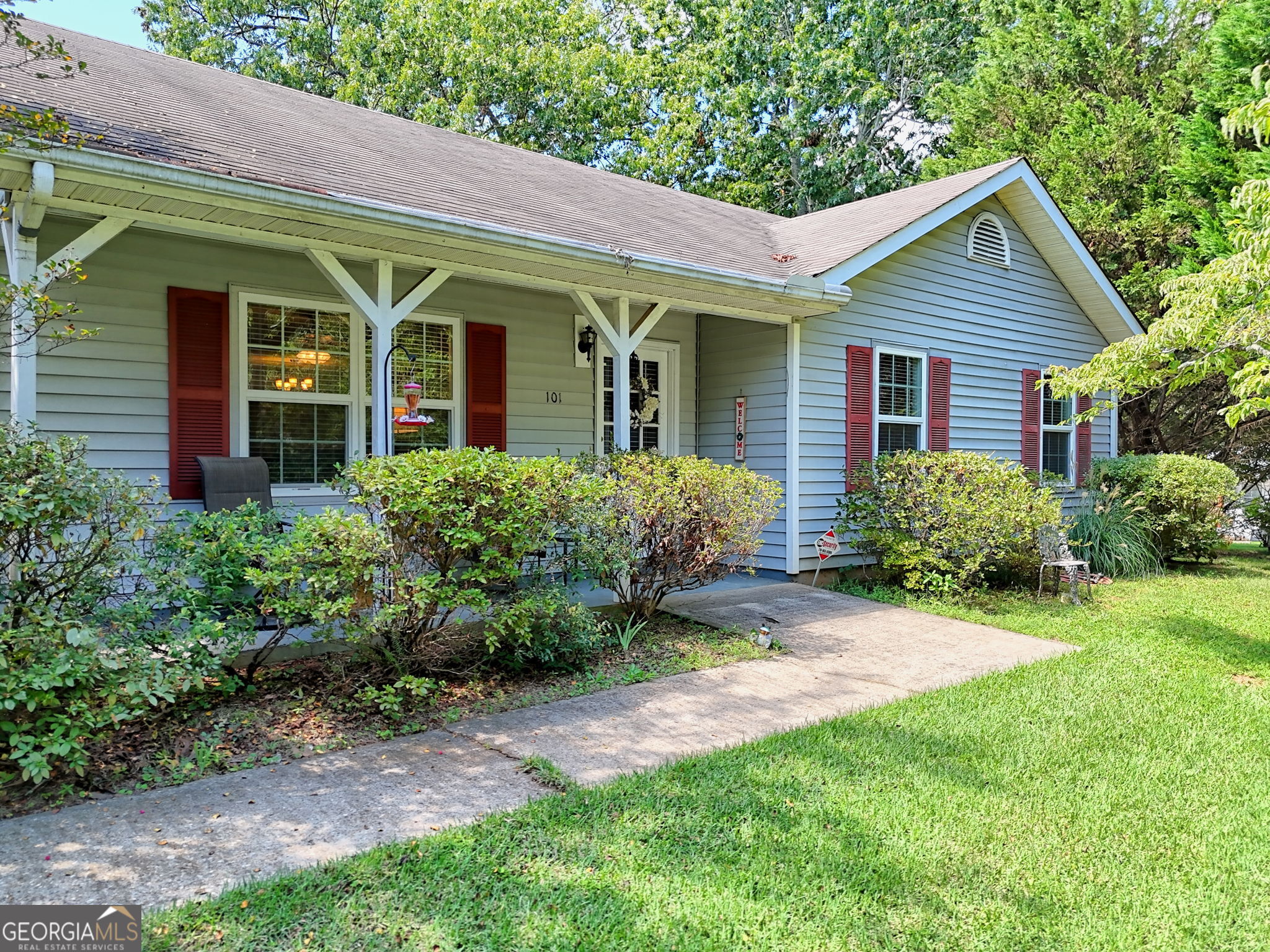 101 Long Street Demorest, GA 30535 - Photo 56 of 61 a view of a house with a yard and potted plants
