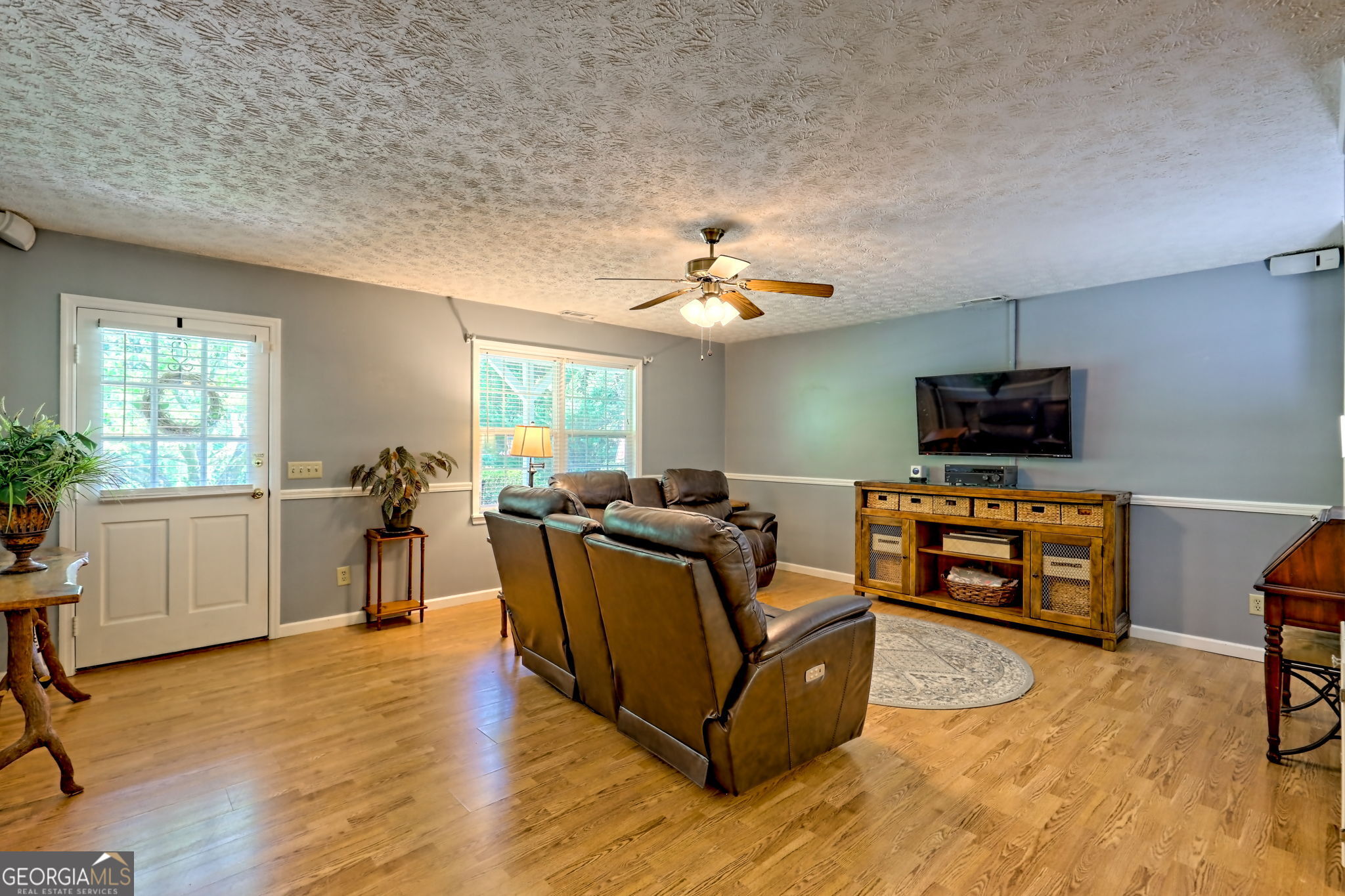 101 Long Street Demorest, GA 30535 - Photo 6 of 61 a living room with furniture and a flat screen tv