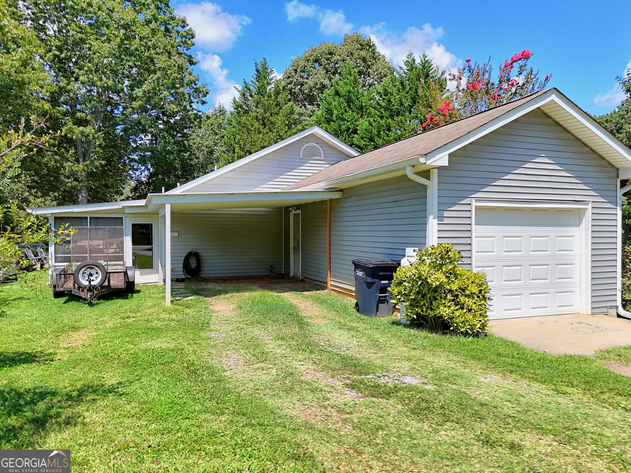 101 Long Street Demorest, GA 30535 - Photo 61 of 61 a view of a house with a yard and garage