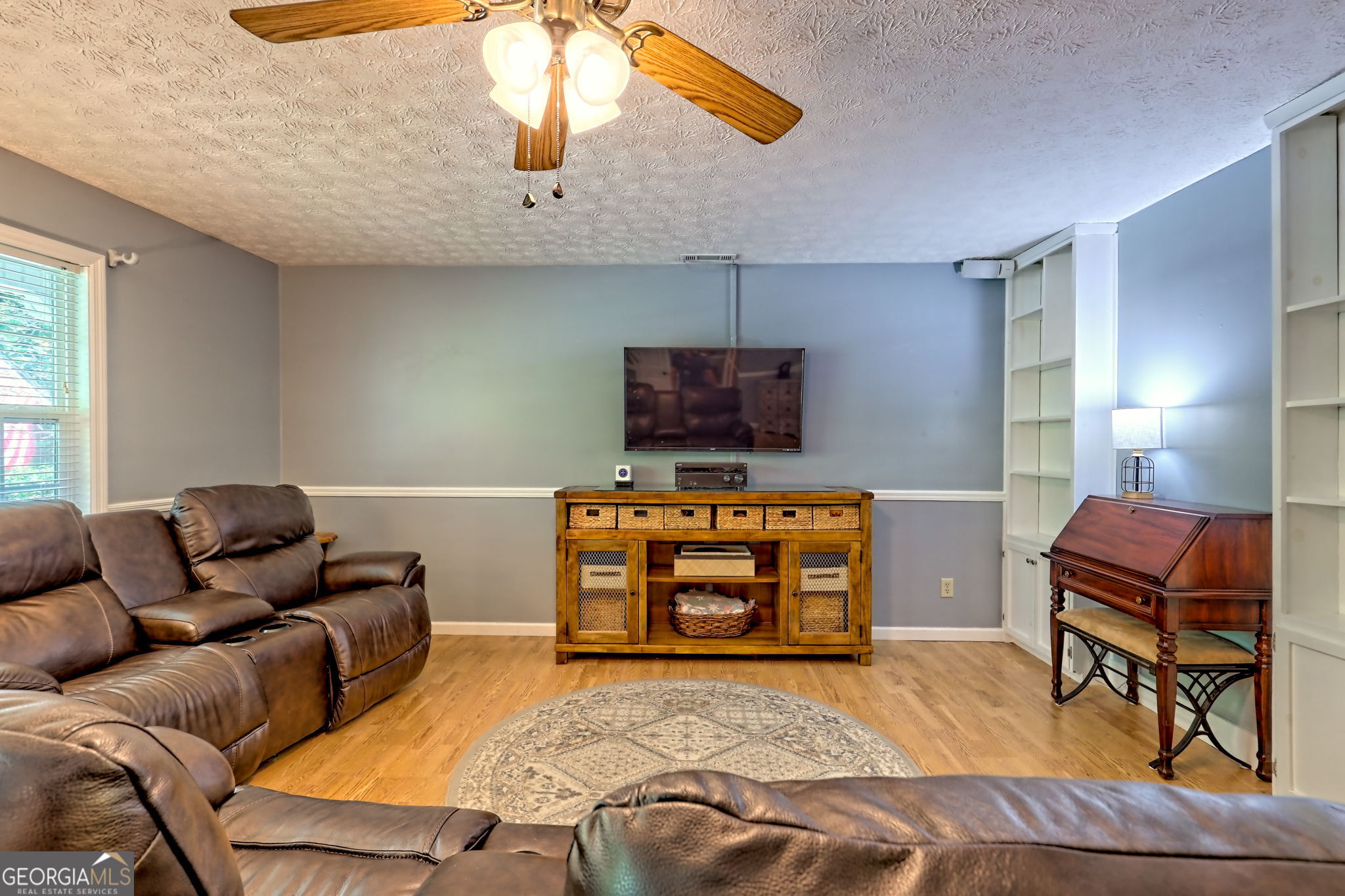 101 Long Street Demorest, GA 30535 - Photo 7 of 61 a living room with furniture and a flat screen tv
