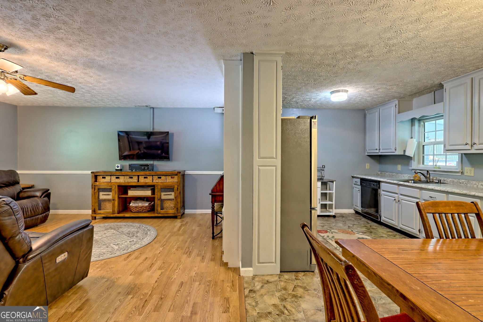 101 Long Street Demorest, GA 30535 - Photo 8 of 61 a kitchen with a refrigerator and a stove top oven