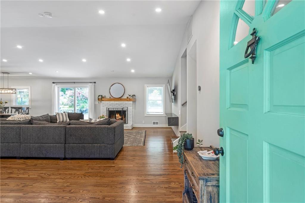 2632 Hawthorne Place Northeast Atlanta, GA 30345 - Photo 13 of 40 a living room with furniture window and wooden floor
