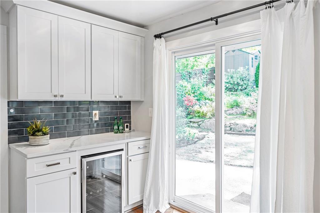 2632 Hawthorne Place Northeast Atlanta, GA 30345 - Photo 23 of 40 a kitchen with a window a counter top space and cabinets