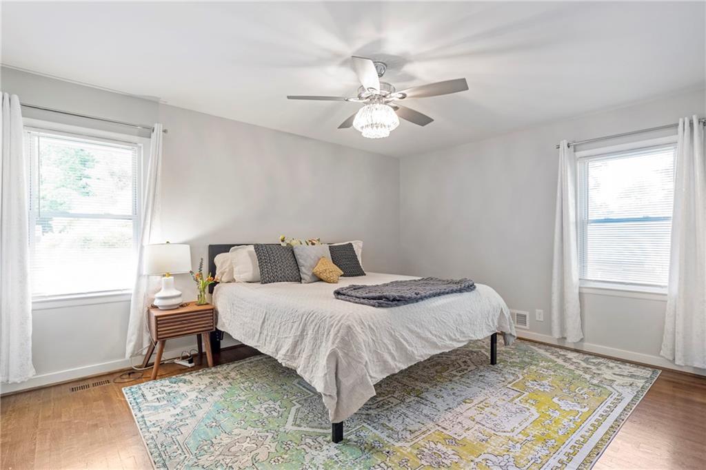 2632 Hawthorne Place Northeast Atlanta, GA 30345 - Photo 26 of 40 a bed sitting in a bedroom next to a window