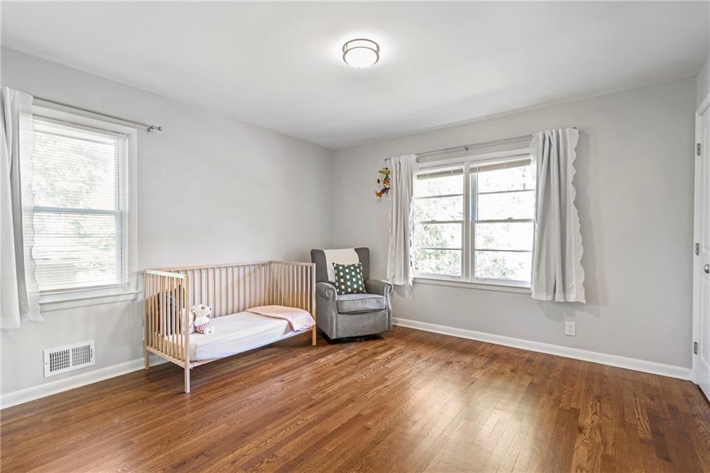 2632 Hawthorne Place Northeast Atlanta, GA 30345 - Photo 29 of 40 a bedroom with furniture and windows
